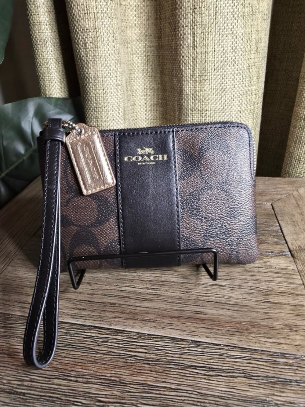 Coach Brown Monogram and Black Leather Wristlet with Gold Logo
NWOT